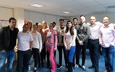 Wearing it pink and fundraising in honour of Breast Cancer Awareness day.